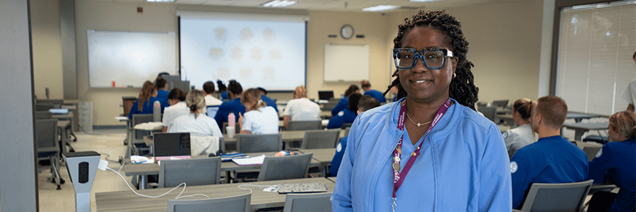 Image of nursing student in class.