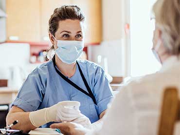 Nurse with patient.