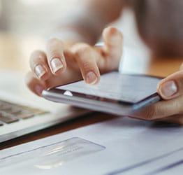 Image of patient using cell phone.