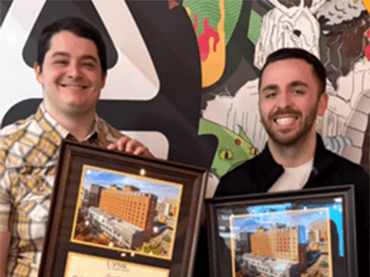 Image of students holding award.
