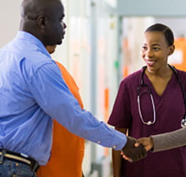 Nurse greeting patient | UPMC Patients and Visitors