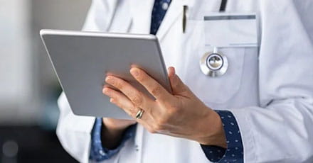 Doctor reviewing chart