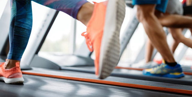 People running on treadmill.