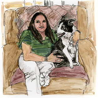 Deidre LaSalvia sits in a chair with her black and white border collie.