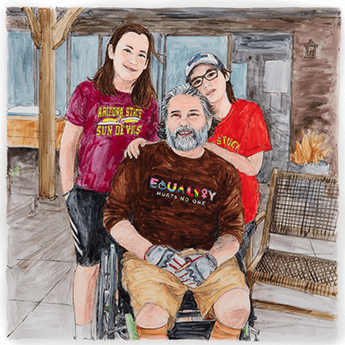 Jared Quinteros sits in a wheelchair with his sones, Oliver and Owen, standing behind him and smiling.