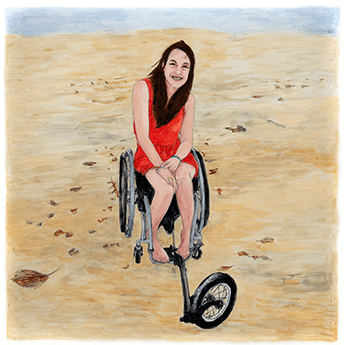 Katie sits on a beach wearing a red dress, smiling in her wheelchair.