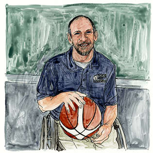 Lee Tempest sits in a wheelchair in front of a green background holding a basketball on his lap.  