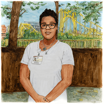 Sara stands outside in front of a yellow bridge. 