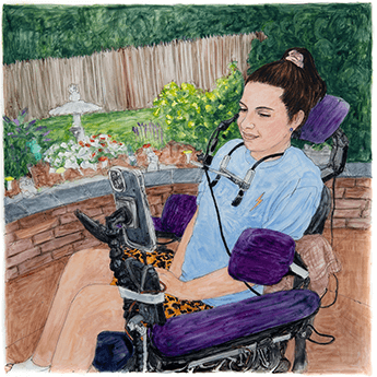 Victoria Verrico sits in a wheelchair in a garden looking at her phone.