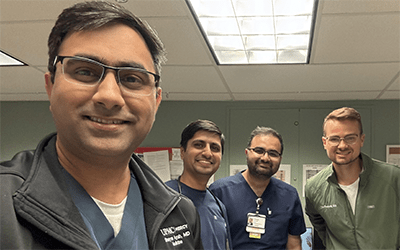 Internal medicine residents hanging in their workroom.