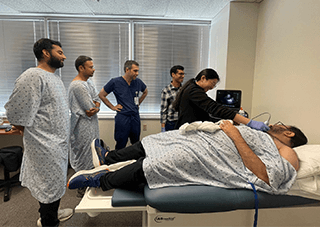 Residents listening to lecture.