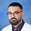 Image of Dr. Natique.