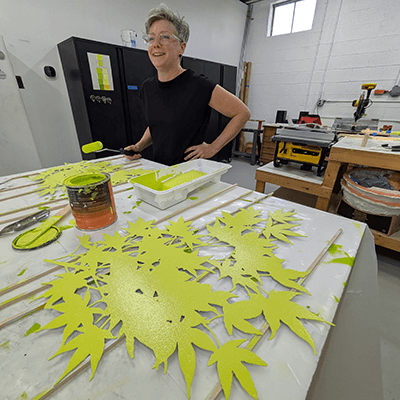 The artist hand-painted each of the branches in her studio. She chose vibrant spring colors. 