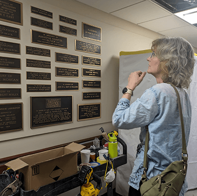 As soon as the artist entered the hallway, she was immediately curious about the names and events commemorated on the plaques. She spent months researching people and examining the hospital archives at the Senator John Heinz History Center. 