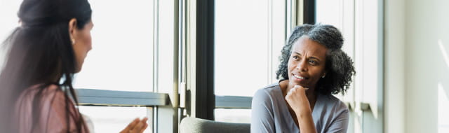 Image of patient speaking with provider.