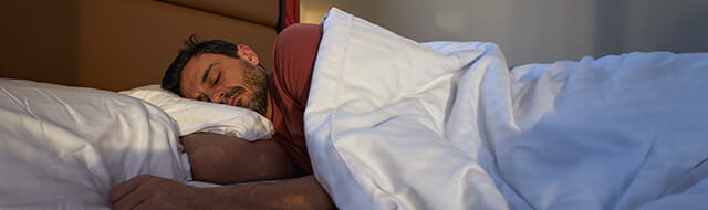 Image of a man sleeping.