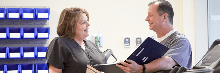 Image of providers talking.