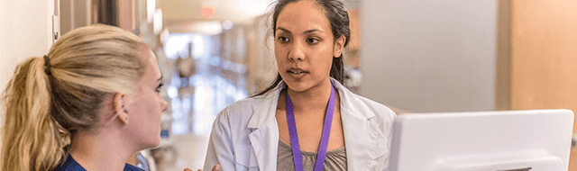 Image of providers talking.