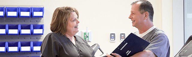 Image of providers talking.