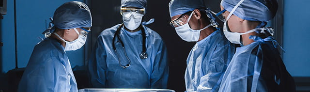 Image of surgeons performing surery.