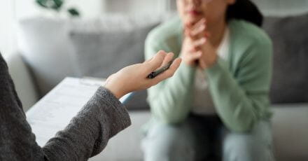 Behavioral health callout image. Image of woman talking to therapist.