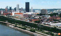 Pittsburgh skyline with UPMC Vision and Rehabilitation Hospital.