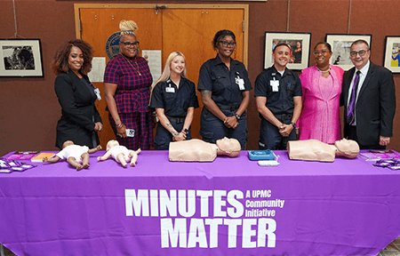 Staff from UPMC Mission Effectiveness and Community LifeTeam EMS pose with Mayor Wanda Williams; Tina Nixon, vice president, Mission Effectiveness and Diversity, Equity and Inclusion, UPMC in Central Pa.; and Lou Baverso, president, UPMC in Central Pa.