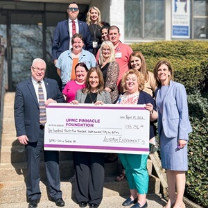 Pictured are Jessica Ritchie, president and chief development officer, UPMC Pinnacle Foundation; Jean Allegrini, wife of Joe Allegrini and former president of the Joe Allegrini Children’s Hero Fund; Shannon Cossaboom, director of operations, UPMC Child Advocacy Center of Central Pa.; Sean McCormack, Cumberland County district attorney; Bryan Kunkle, detective, Lower Paxton Township Police Department; and staff members of the UPMC Child Advocacy Center of Central Pa. at a check presentation April 14.