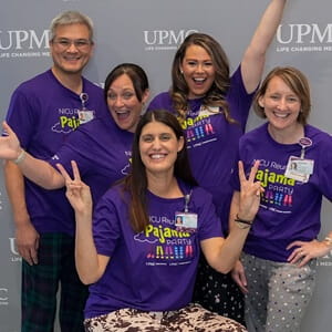 Members of the UPMC team gather to celebrate former NICU patients and their families at the reunion event.
