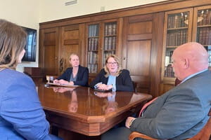 Patti Jackson-Gehris, market president, UPMC North Central Pa., along with other hospital system leaders, speaks with U.S. Rep. GT Thompson to advocate for affordable care in rural communities.