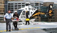 A patient is transferred from a STAT MedEvac to UPMC Presbyterian Hospital. Credit: UPMC.