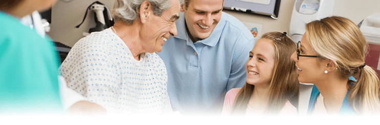 Family and friends visiting a patient in the hospital.