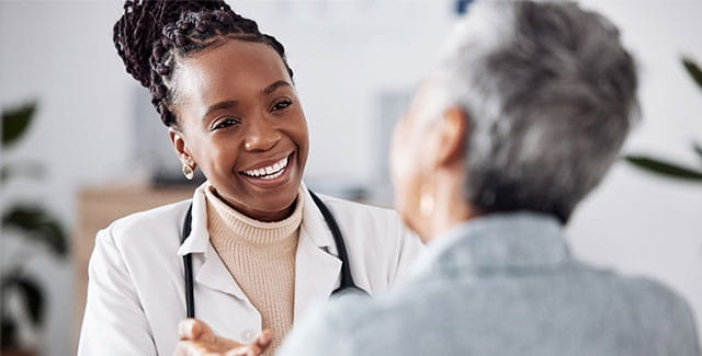 Doctor talking to patient.