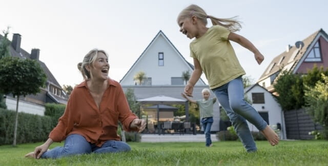 A younger man embracing an older man