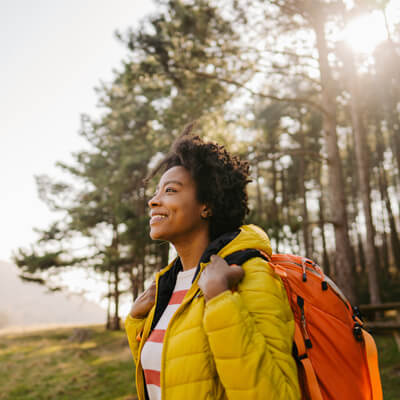 Image of female hiker smiling.