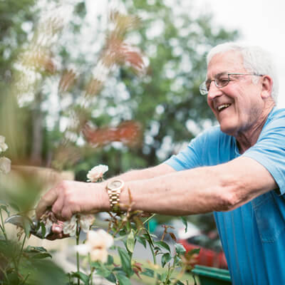 Image of man gardening.