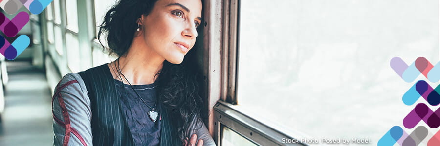 Addiction services banner. Image of woman looking out window.