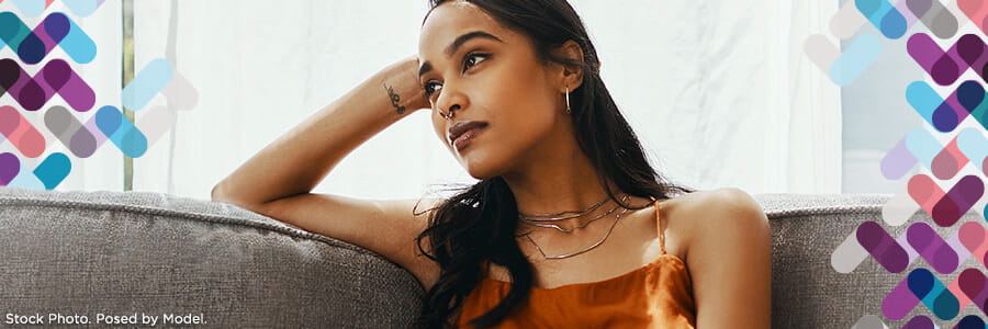 Eating disorders banner. Image of woman looking out window.