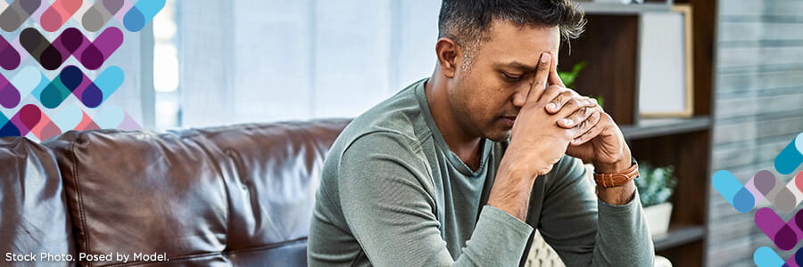 Emergency and Crisis Services Banner - image of man holding head.