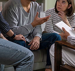 Image of people talking to provider.