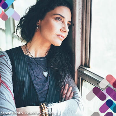 Addiction services callout. Image of woman looking out window.