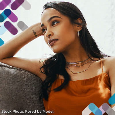 Eating disorders callout image. Image of woman looking out window.