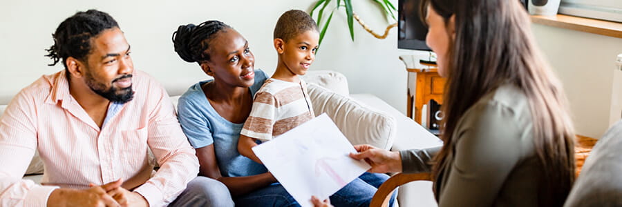 Image of family speaking with a doctor.