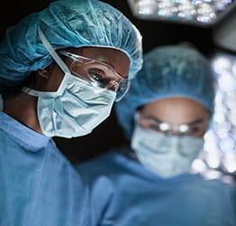 Surgeons in operating room