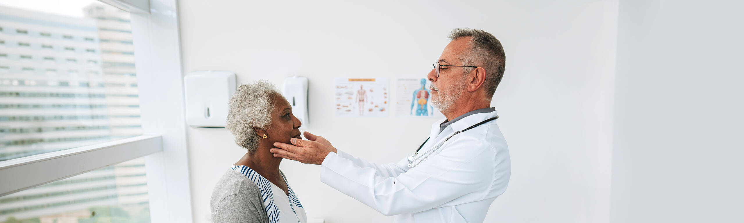 Endocrinologist physician examines patient