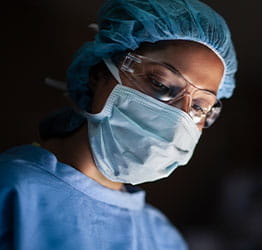 Close up on surgeon's face in scrubs