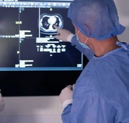 Doctor reviewing patient's scans