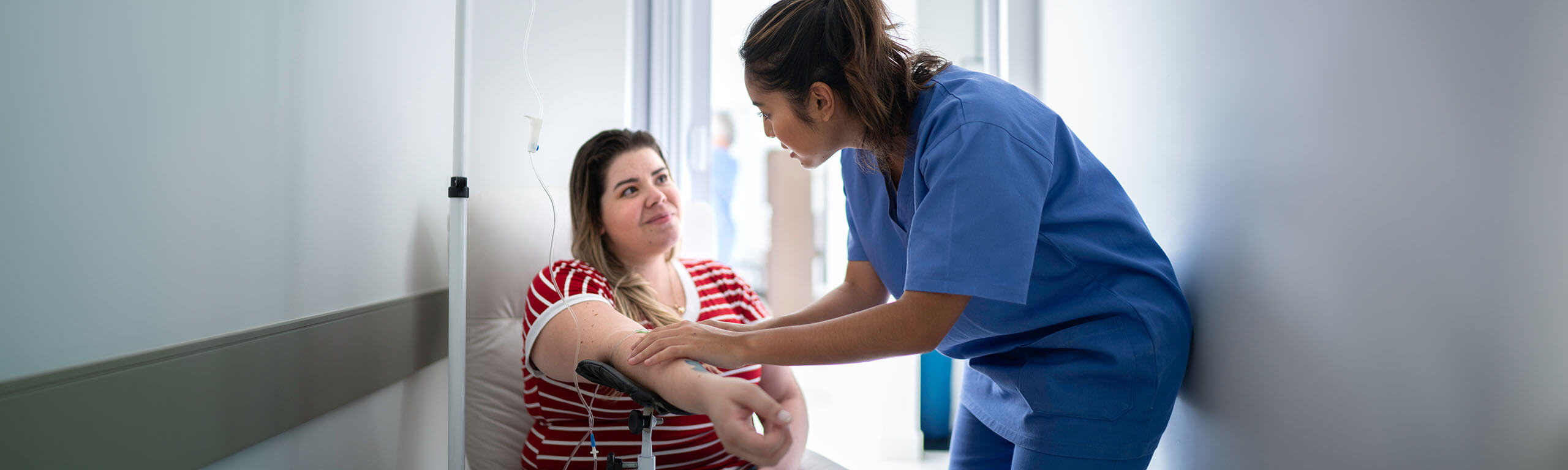 Homepage banner. Image of patient receiving care.