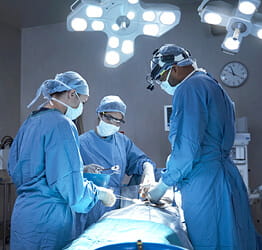 Surgeons in operating room