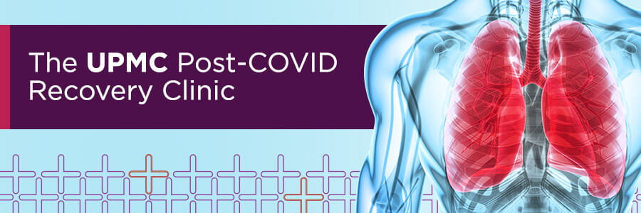 A doctor reads a chart. His pointer finger is noting something on a clipboard. Three patients, two women and one man, watch him. They all wear masks.